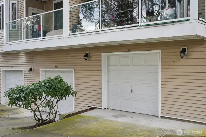 Tandem garage parking located behind the building