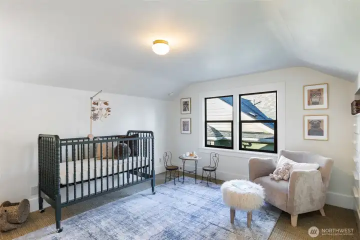Right across the landing, here's the second of three upstairs bedrooms. Built in dresser and good-size closet.