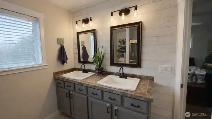 Primary En suite bathroom with double sinks