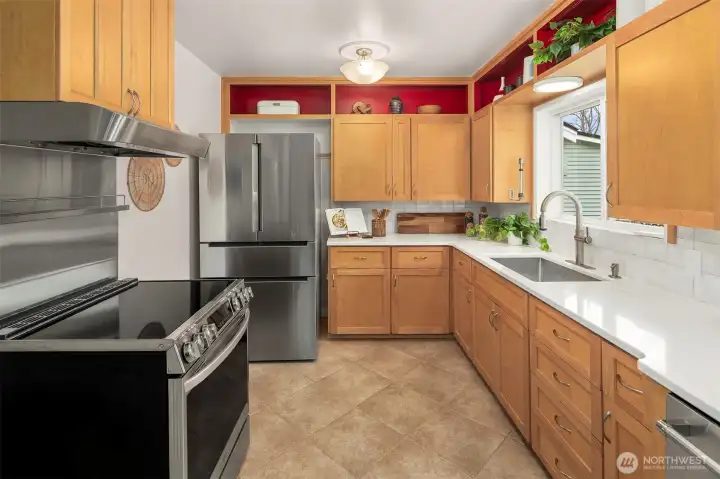 Tons of storage and plenty of space to move around in this incredible kitchen!