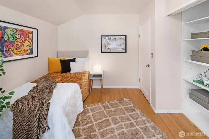 Second bedroom has wonderful eastern light and a large closet.