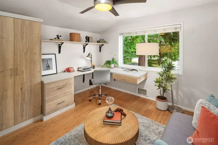 Third bedroom currently has a gorgeous built in desk and cabinet, but could easily be converted to a bedroom.