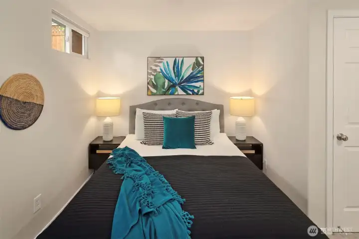 The basement bedroom also can fit a king bed and is wonderful for guests.