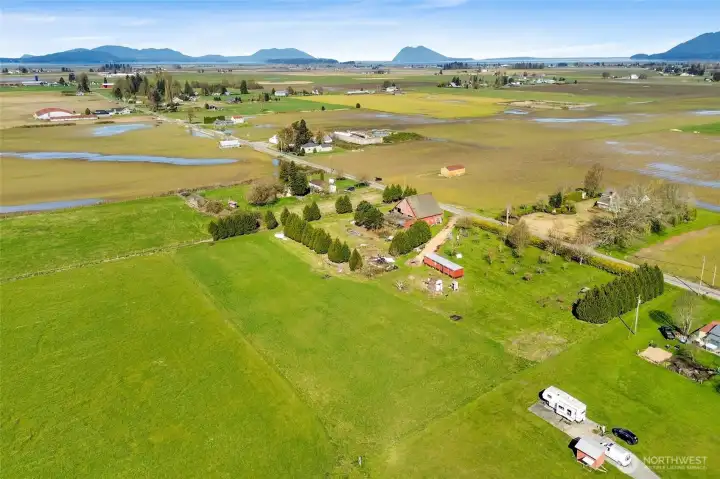 Welcome to 16068 Field Rd. 4.68 acres in a quiet part of desireable Bow