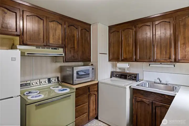 Kitchen area. Clean and usable appliances