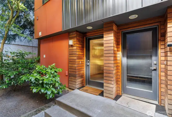 This contemporary end-unit townhome is private, yet close to everything.