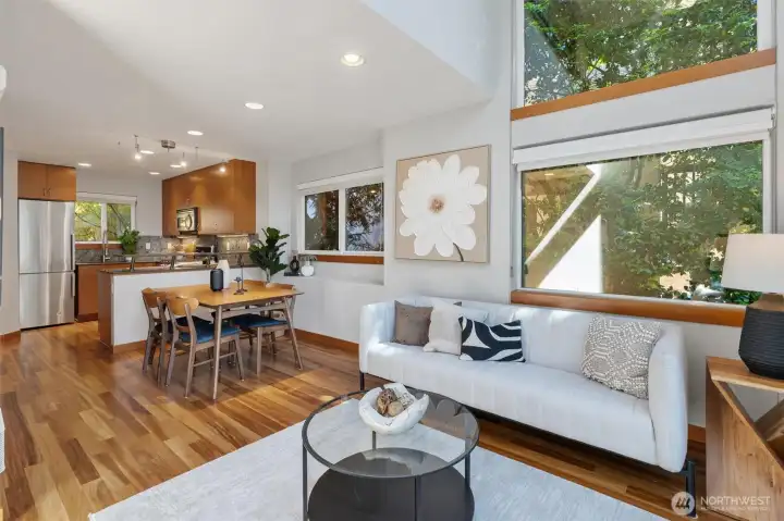 Lush greenery makes this end unit feel tranquil and private.