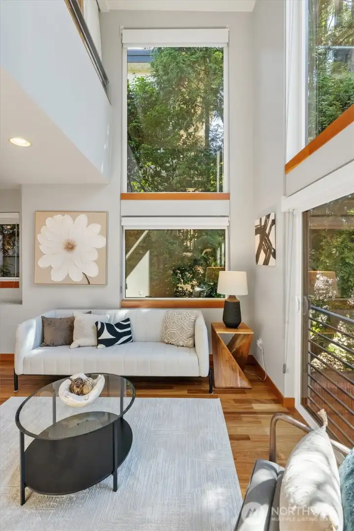 Lush greenery makes this end unit feel tranquil and private.