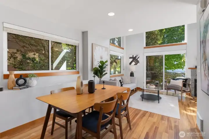 The living room flows seamlessly into the dining area and kitchen.