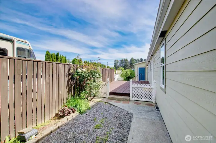 View along side of home from backyard toward front. View along side of home from backyard toward front.