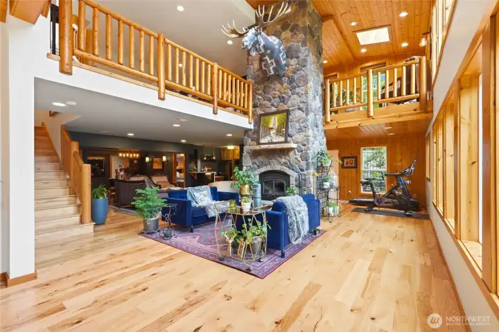 lower level fire place and great room view from entry