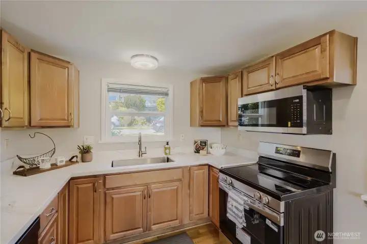 New quartz countertops and backsplash, new refridgerator, stove and microwave New quartz countertops and backsplash, new refridgerator, stove and microwave