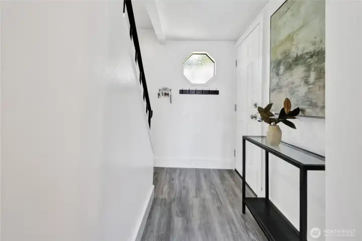 Main floor hallway looking back towards the front door.