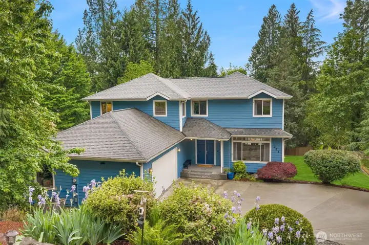 Move in and enjoy your worry-free retreat. The big stuff is done — 2021 roof, 2022 furnace and A/C, 2020 drainage overhaul — plus thoughtful extras like a Level 2 EV charger and generator hook-up.