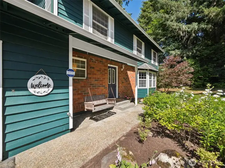 A closer view of the front porch and the distinctive red brick.