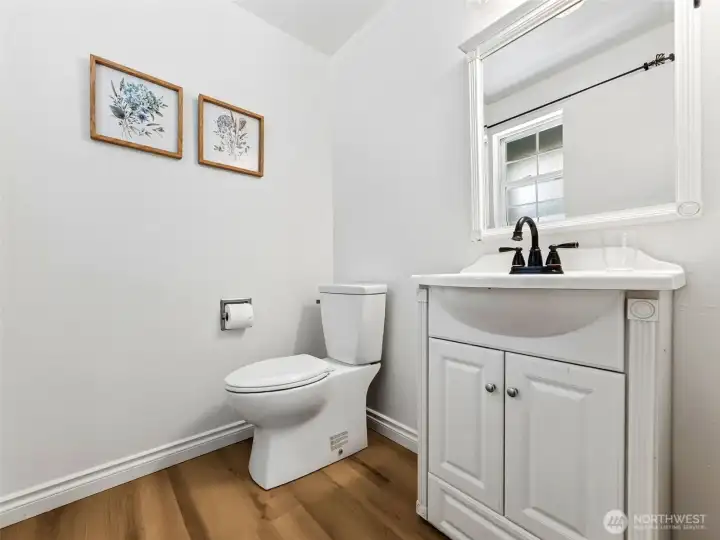 Convenient downstairs powder room.
