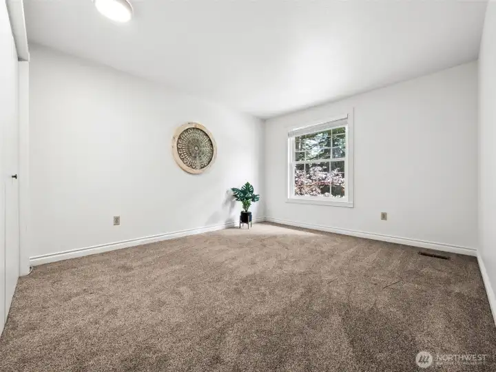 Bedroom #3 with large closet, new paint and carpet.