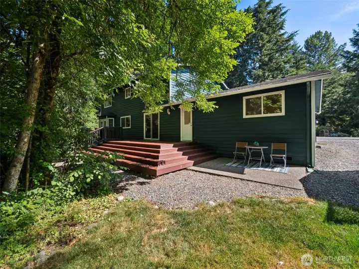Heres the deck and the sunny patio off the back of the house.