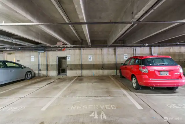 One of TWO designated parking spots in the secure garage.
