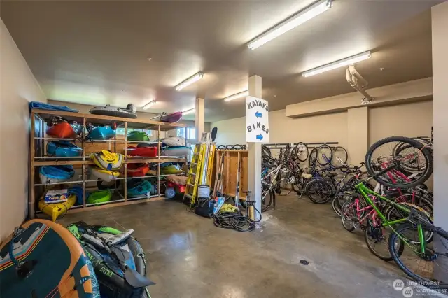 Limited community storage for kayaks and biked at unit #110.  Not all of the kayak storage is seen here.  Owners have their own key for this storage.