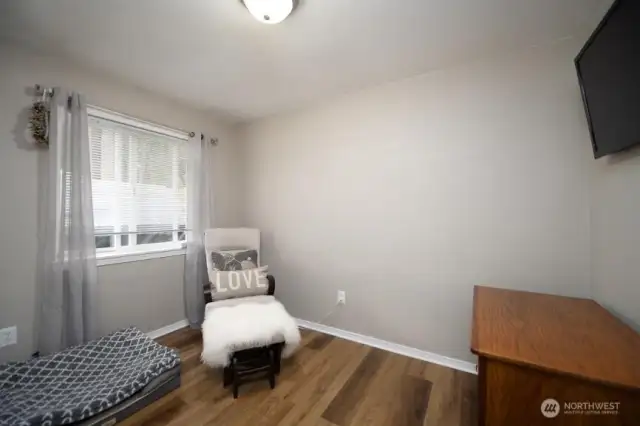 2nd Bedroom at the end of the fall.  Perfect for sewing room and the TV stays!
