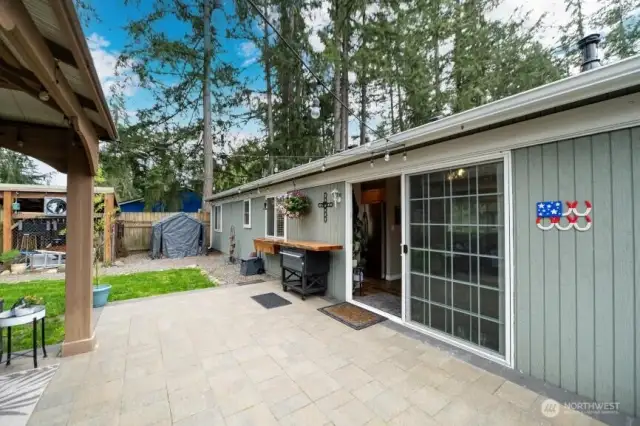 Entertain year round.  Hand laid stone provide even walking and beauty to this patio.
