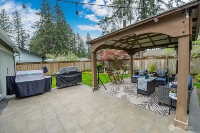 Enjoy room for your outdoor kitchen!  Tranquil back yard is fully fenced and private!