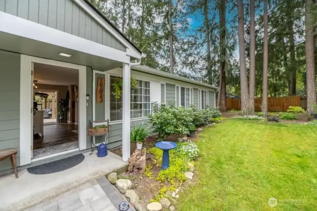 Come on in.  Hand laid stone provide a stunning walk-way.