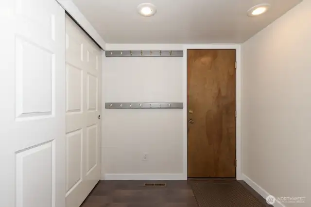 Mud room off from garage with storage and drop zone!
