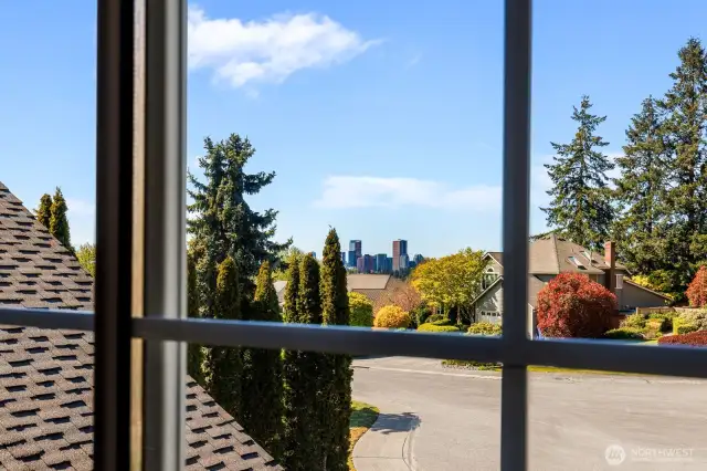 Primary Bedroom with Bellevue Skyline and Mountain views.