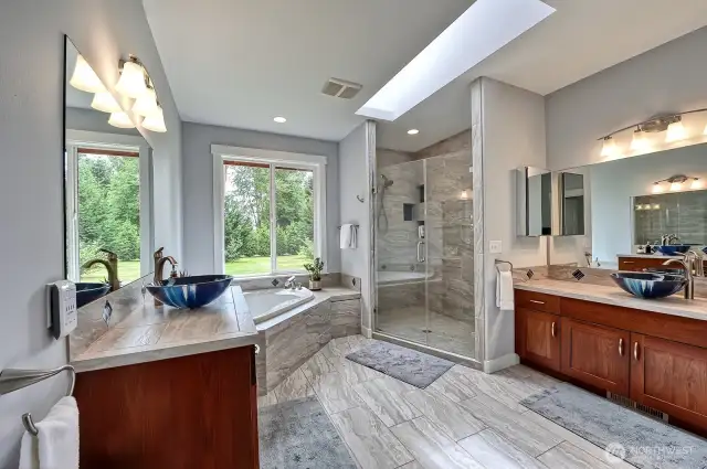 Enjoy a soak with your serene backyard as the view.