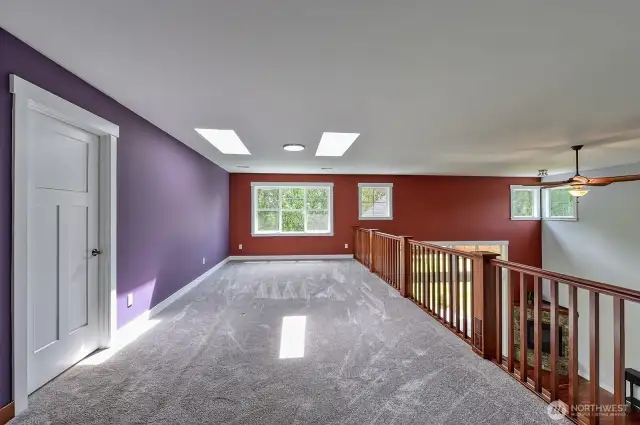 Loft upstairs offers not only bonus space, but a wonderful view of the great room.