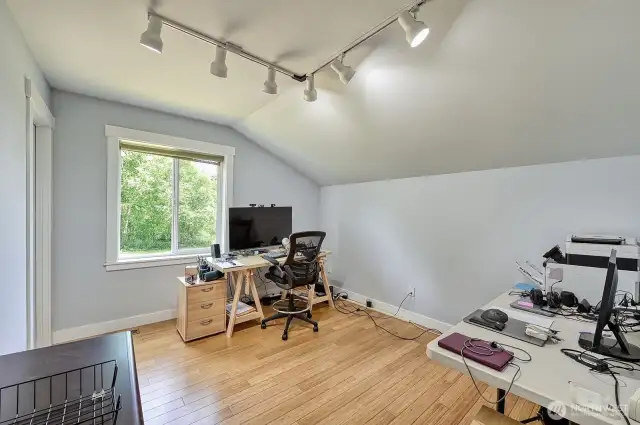 Third bedroom upstairs. Every room looks out to the beautiful property with relaxing views.