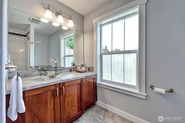 from the etched window to the custom sink, no detail has been overlooked.