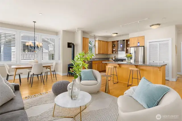 Spacious great room with high ceilings, an open floor plan, and beautiful natural light flowing through the space.