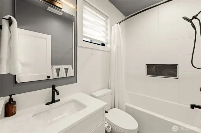 Full bath off the 3rd bedroom.
