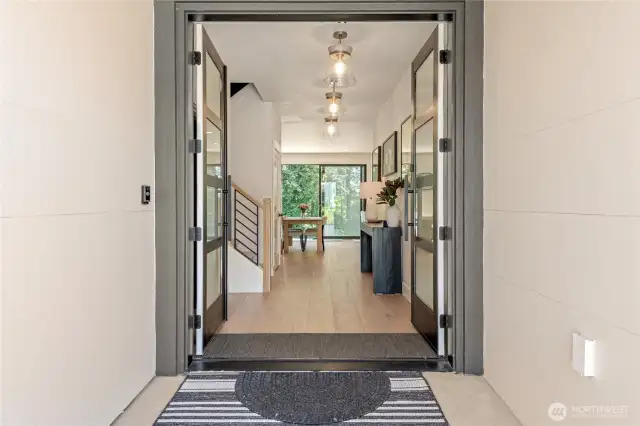 There are no steps into the home and the In-Law Suite is immediately to the left.