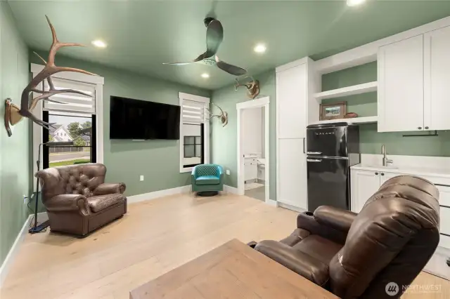 In-Law Suite is just a few feet away from the front door and there are no steps as you enter. There is a Separate LG Washer/Dryer, built-in fridge, mini-bar, pantry and cabinet space.