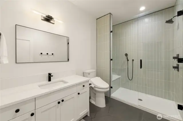 In-Law Suite bathroom with a zero step walk-in shower.
