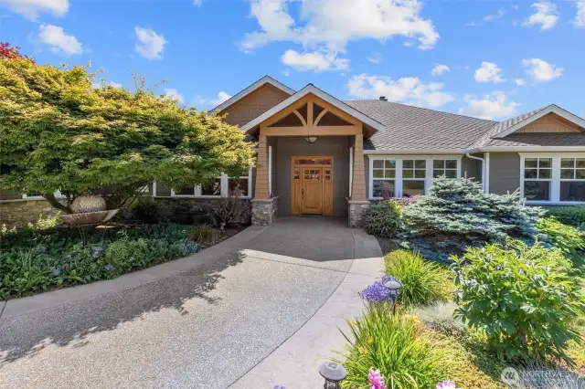 A Grand Entry! Fully Level And Beautifully Landscaped!