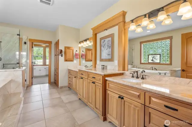 Step into this luxurious Primary Full Bathroom and feel like you have your own Spa!! Slab granite dual bathroom stations, jetted tub and walk-in oversized glass shower! This walks into a HUGE walk-in closet/dressing room!
