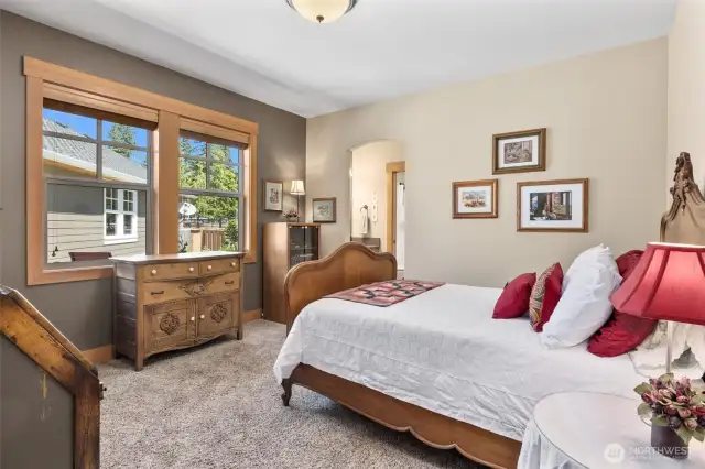 Guest bedroom has it's own Jack and Jill style bathroom with a twist! Separate vanity rooms for easy living!