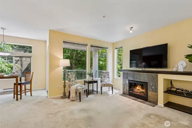 Lovely tiled electric fireplace will be so enjoyed in the winter months.
