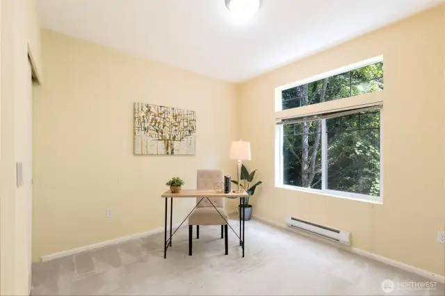 Used and staged as an office, this is the 2nd bedroom, with a closet inside to the left.