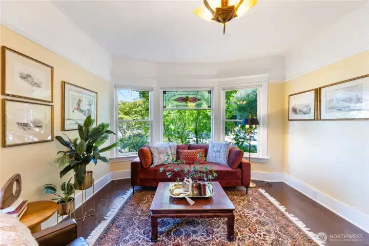 Lots of options for furniture placement. Large opening windows.  Room for artwork and more.