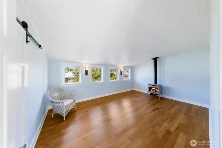Here is a large Bedroom with walk-in closet and gas fireplace.