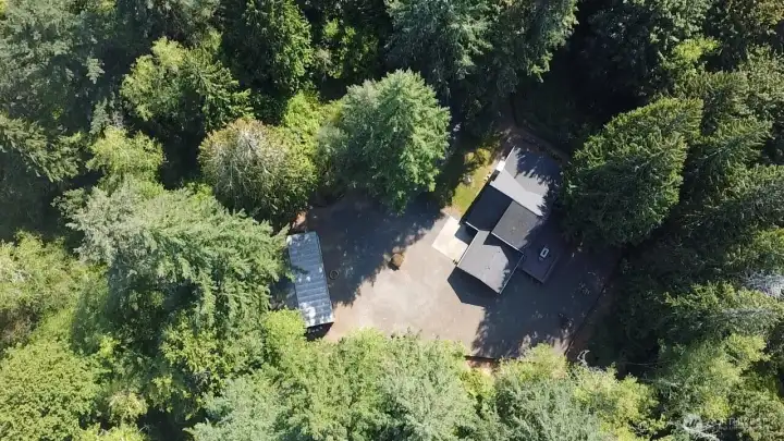 Aerial showing home and shop.