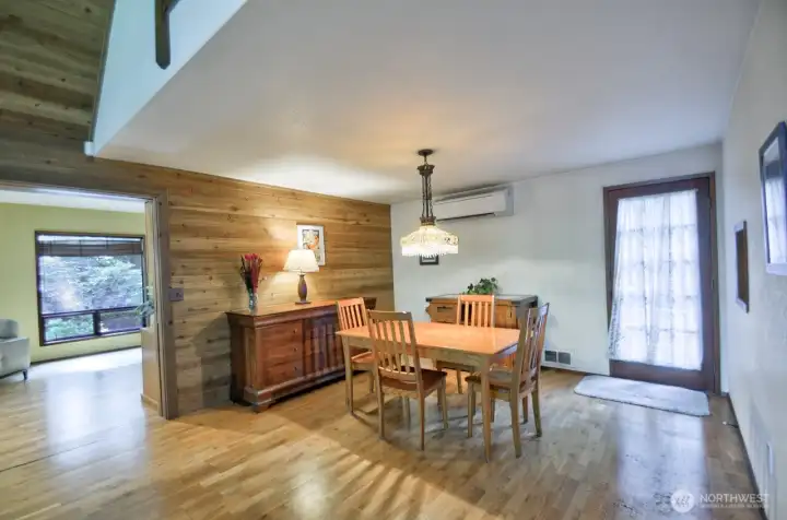 Dining room with door to outside.
