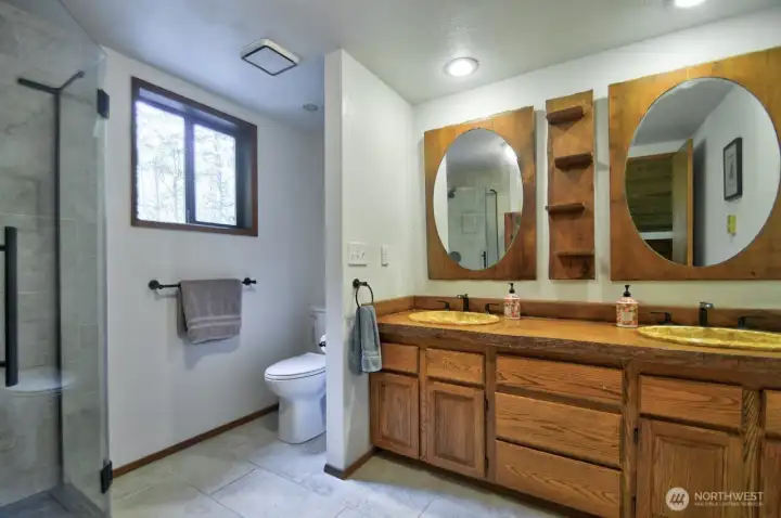 Primary bath has stone double sinks!