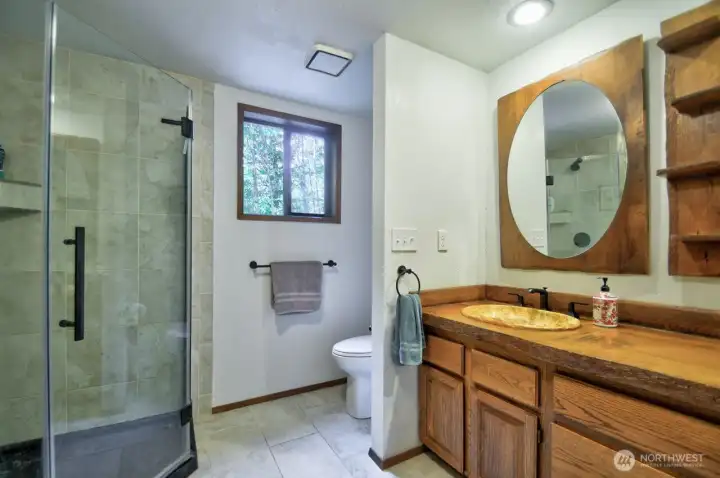 Glass shower stall.